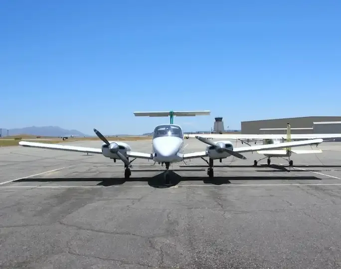 Beechcraft Duchess BE-76 twin-engine training aircraft on the ramp at Riverside Municipal Airport